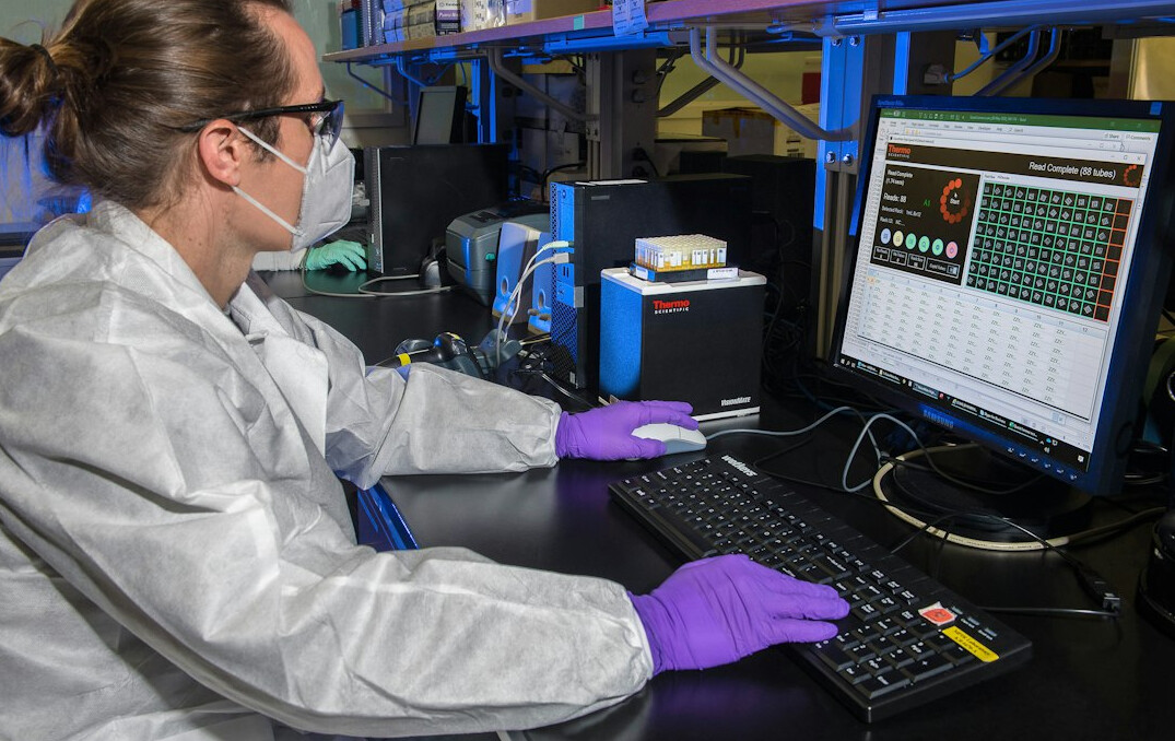 forensic scientist examining evidence