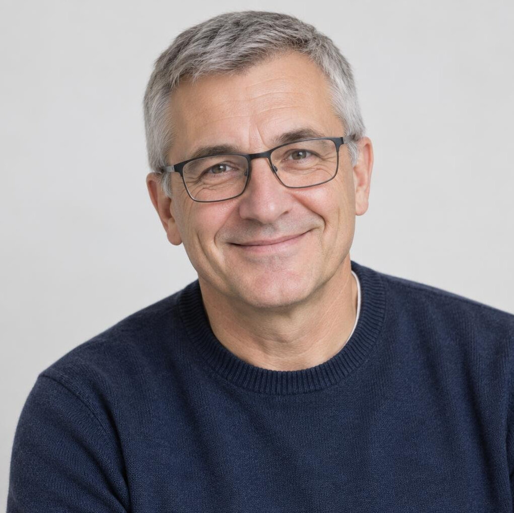 Croatian man in his fifties with glasses smiling